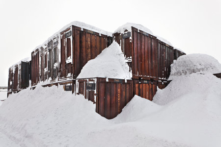 Shipping containers covered in snowの写真素材