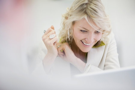 Businesswoman smiling in officeの写真素材