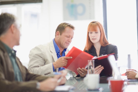 Business people talking in meetingの写真素材