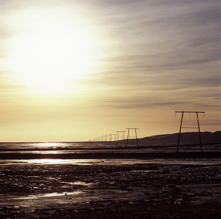 Power lines in rural landscapeの写真素材