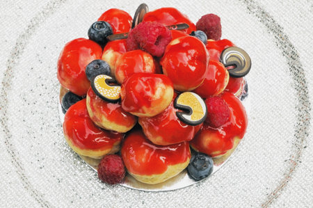 Close up of fruit profiterole cake