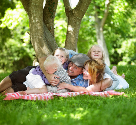 Family having picnic togetherの写真素材