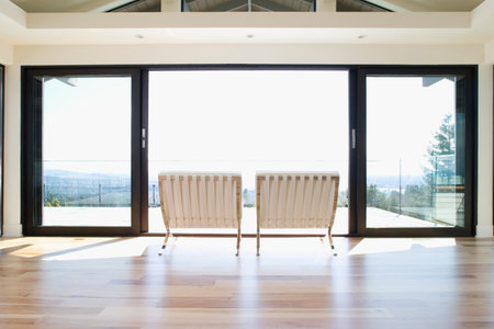 Chairs by patio doorsの写真素材