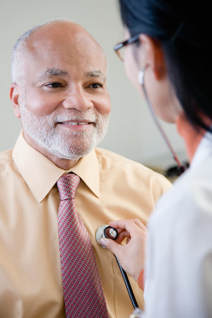 A doctor examining a patientの写真素材