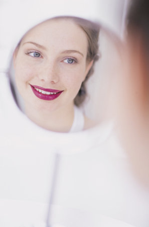 Woman in mirrorの写真素材
