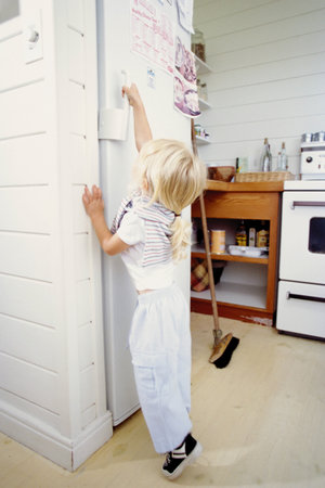 Girl in the kitchenの写真素材