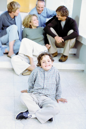 Boy with parents and grandparentsの写真素材