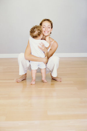 Mother hugging babyの写真素材