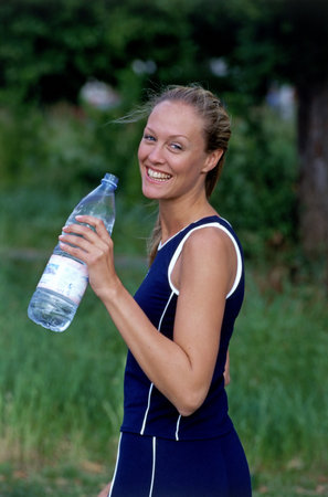 Girl drinking waterの写真素材