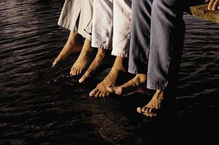 Feet paddling in the water