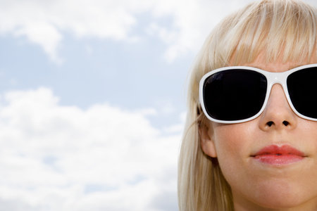 Young woman wearing sunglassesの写真素材