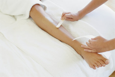 Woman being waxedの写真素材