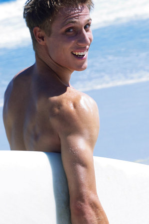 Surfer on beachの写真素材