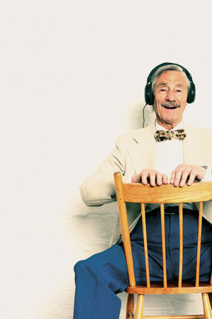 Old man listening to musicの写真素材