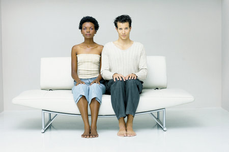 Man and woman seatedの写真素材