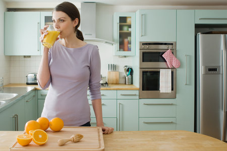 Woman with orange juiceの写真素材