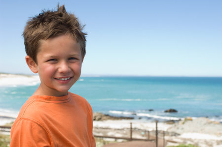 Boy at the seasideの写真素材