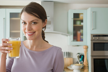 Woman with orange juiceの写真素材