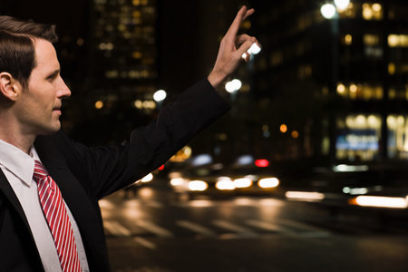 Businessman hailing a cab