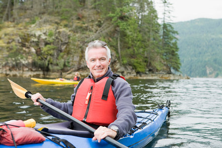 Man kayakingの写真素材