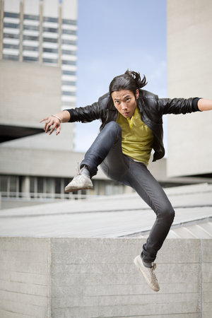 A young man kicking