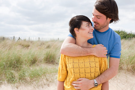 Young couple at the coastの写真素材