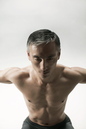 Muscular mature man, front viewの写真素材