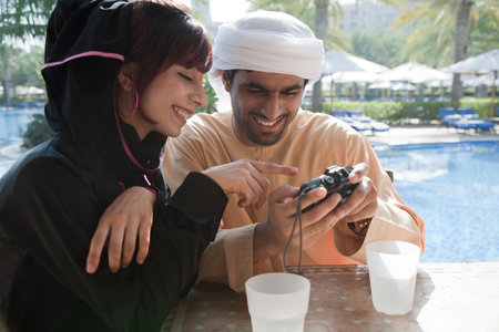 Middle Eastern people looking at camera