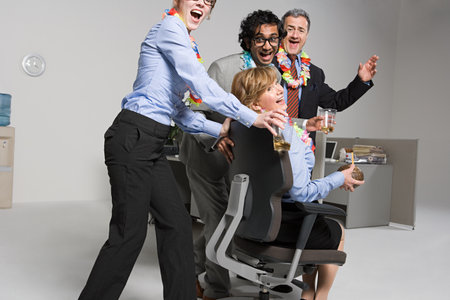 Business people enjoying office partyの写真素材