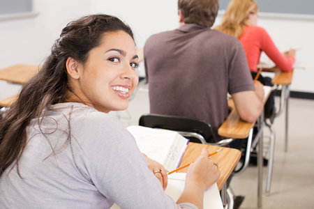 High school students sitting in classroomの写真素材