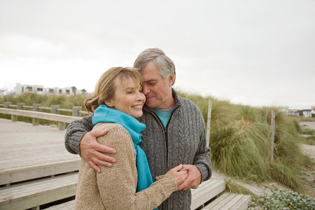 Loving couple at the coastの写真素材