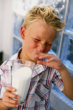 Boy drinking milkの写真素材