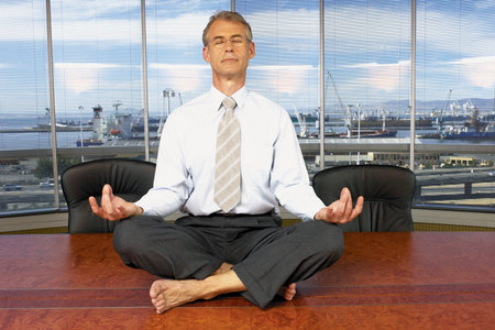 Meditating businessmanの写真素材