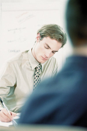 Businessmen in officeの写真素材