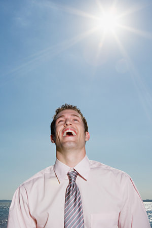 Male office worker laughingの写真素材