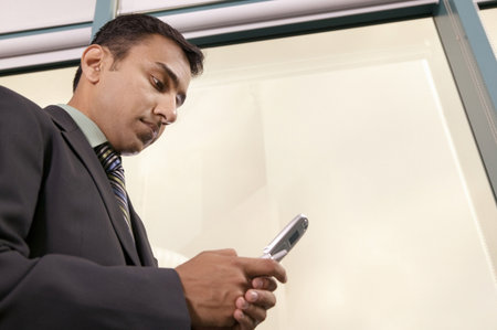 Businessman using cell phoneの写真素材