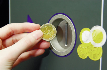 Machine accepting euro coinsの写真素材