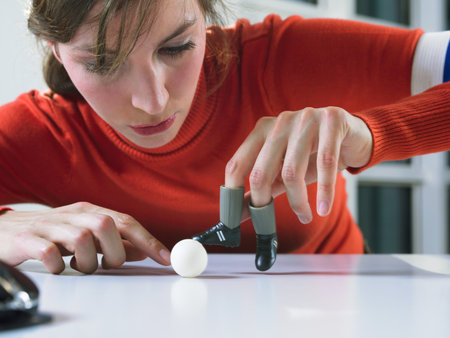 Woman playing mini footballの写真素材