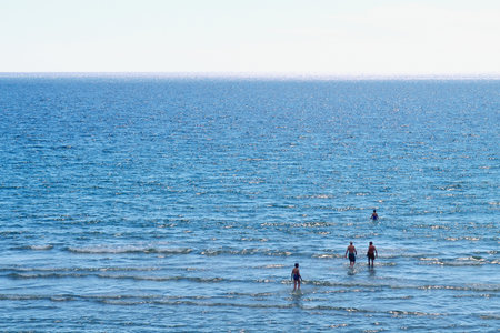 People walking in seaの写真素材