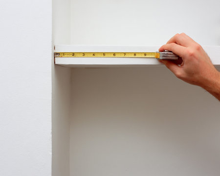 Measuring shelf lengthの写真素材