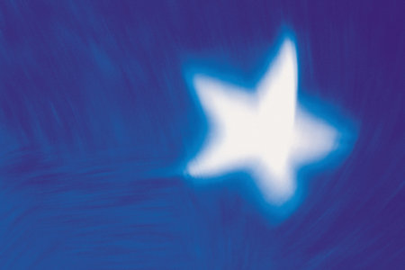 White star with motion blurの写真素材