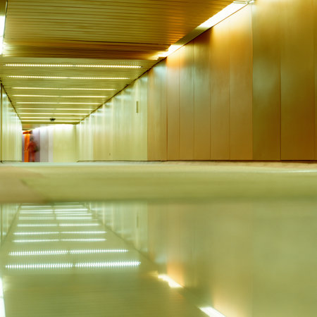 Blurred person in empty corridorの写真素材