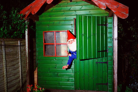 Garden gnome inside shed