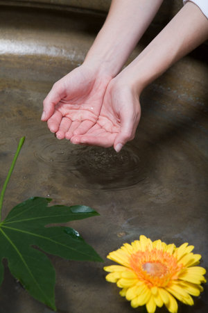A woman with cupped handsの写真素材