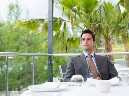A businessman thinking close up.の写真素材