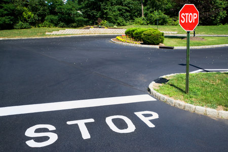 Stop signs in suburban streetの写真素材
