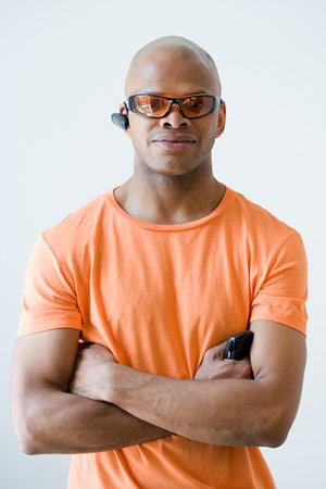 Man wearing headset and sunglassesの写真素材