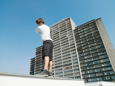 Golfer on a wallの写真素材