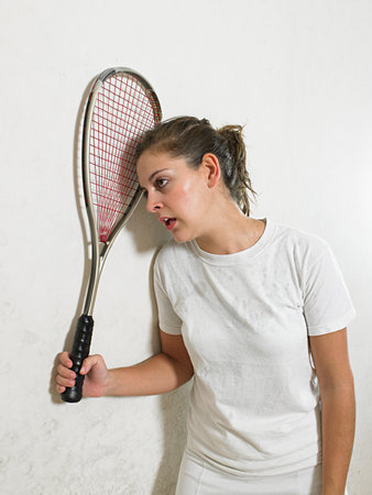 Exhausted squash playerの写真素材