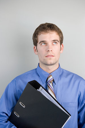 Office worker with a folderの写真素材